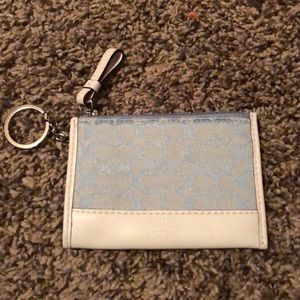 Blue and white coach coin purse